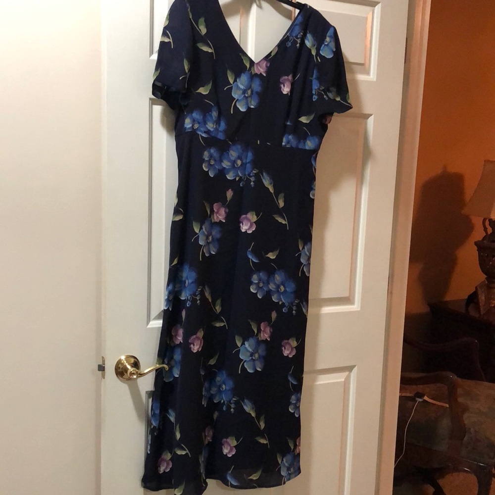 Navy floral women dress,size14, V neck front & back,Zips up back, built in slip.